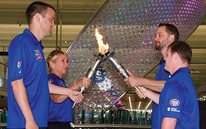 Huegen part of law enforcement torch run for Special Olympics USA games