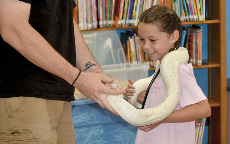 Youth get up close and personal with reptiles at Breese Public Library